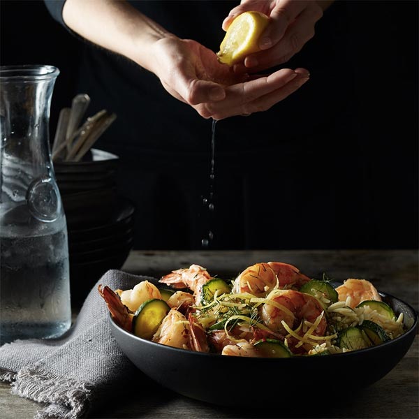 Fresh shrimp and zucchini bowl with lemon