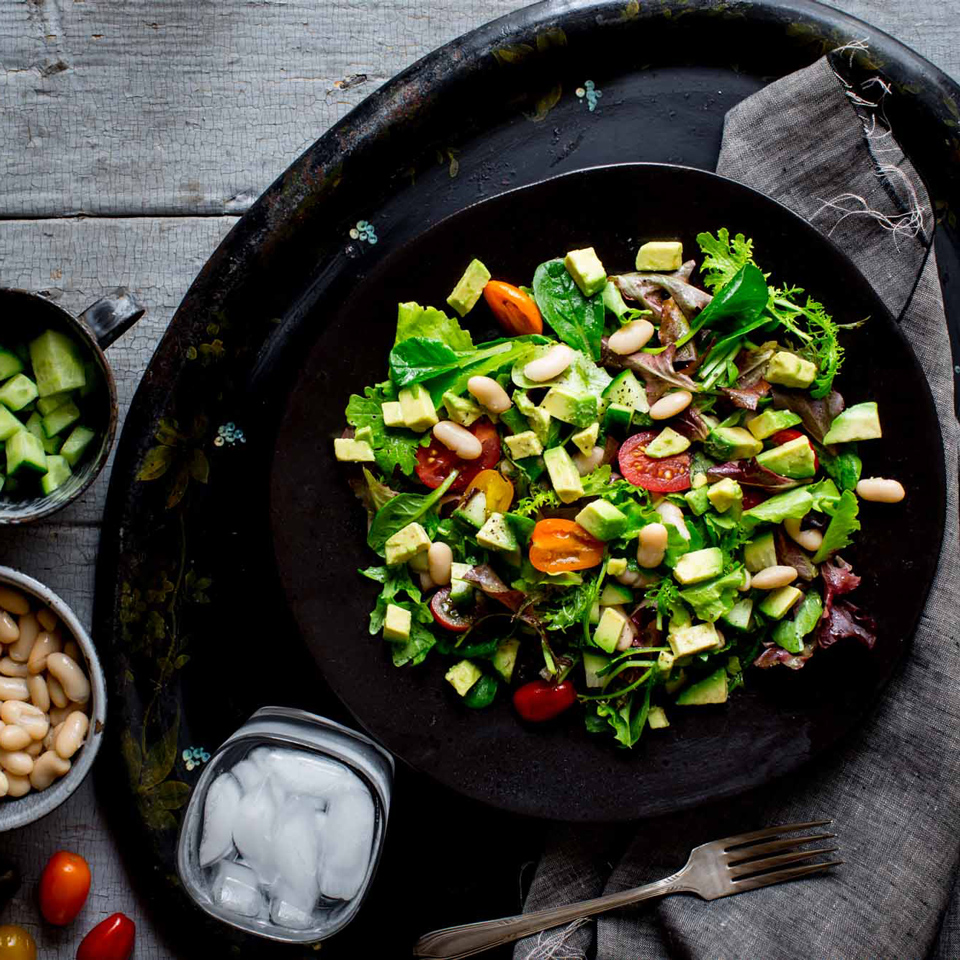Whole food salad with avocado and beans