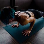 Photo by Karl Solano: https://www.pexels.com/photo/woman-doing-push-ups-2780762/